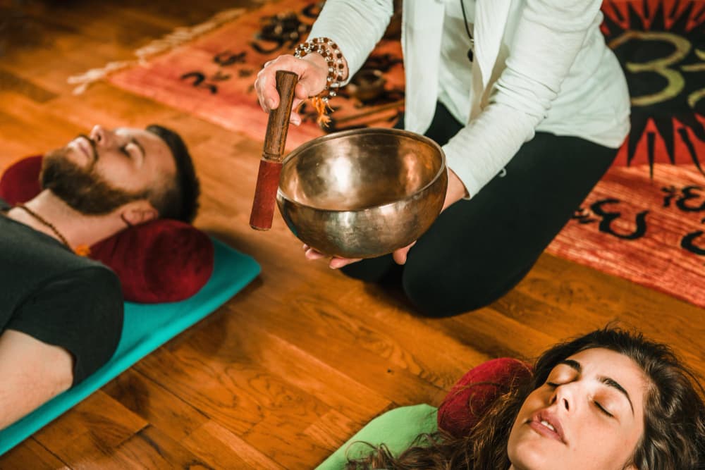 Ayurvedic practitioner administering Nasya karma — medicated nasal therapy for ENT disorders.